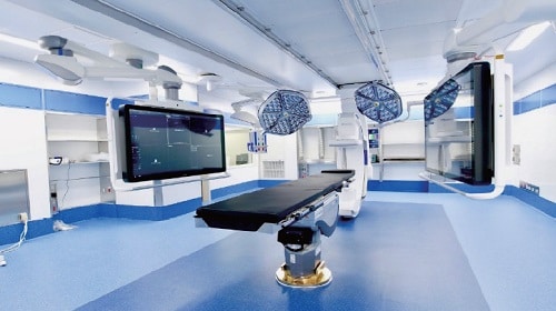An operation room with two screens